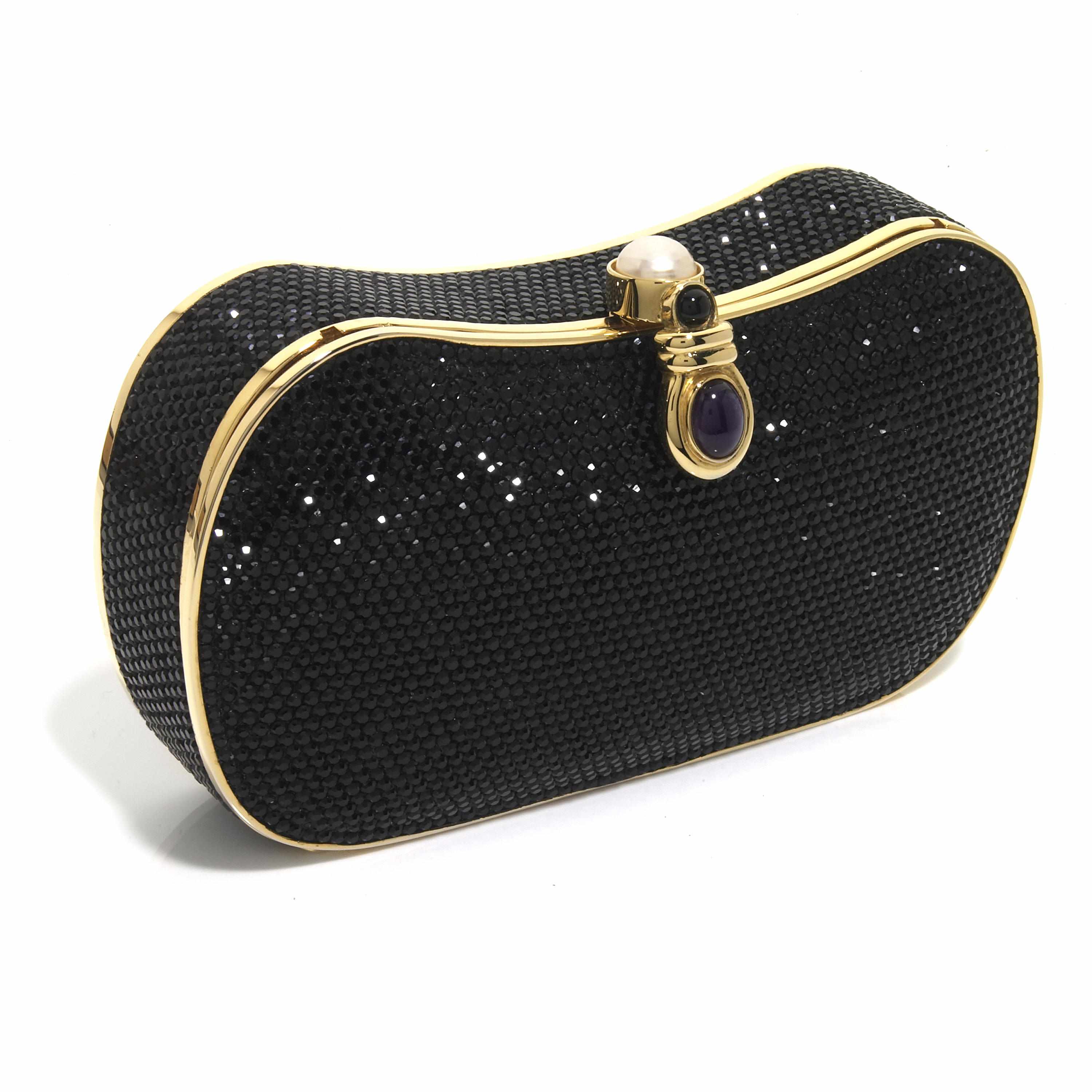 Appraisal: A kidney shaped black crystal purse with a purple stone