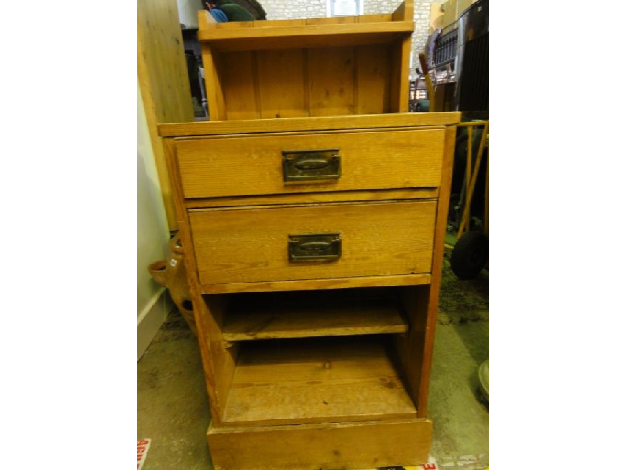 Appraisal: An Edwardian stripped pine pedestal chest washstand with raised single