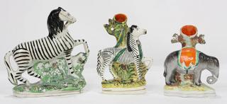 Appraisal: lot of Staffordshire figural groups consisting of an elephant with