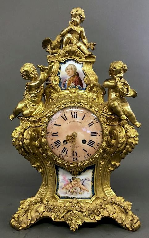 Appraisal: Ornate French Brass Clock with Putti Ornate French brass clock