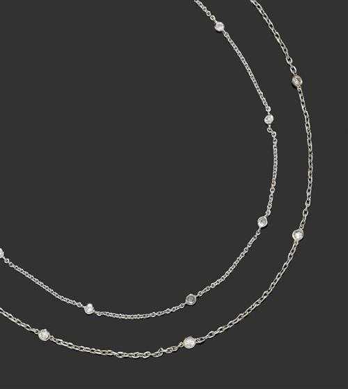 Appraisal: TWO BRILLIANT-CUT DIAMOND AND GOLD NECKLACES ca Platinum and white