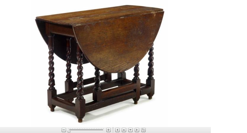 Appraisal: George III oak gate-leg table the drop-leaf top over spiral