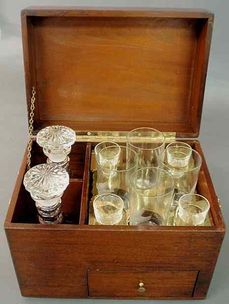 Appraisal: Mahogany case decanter set th c the glassware etched with