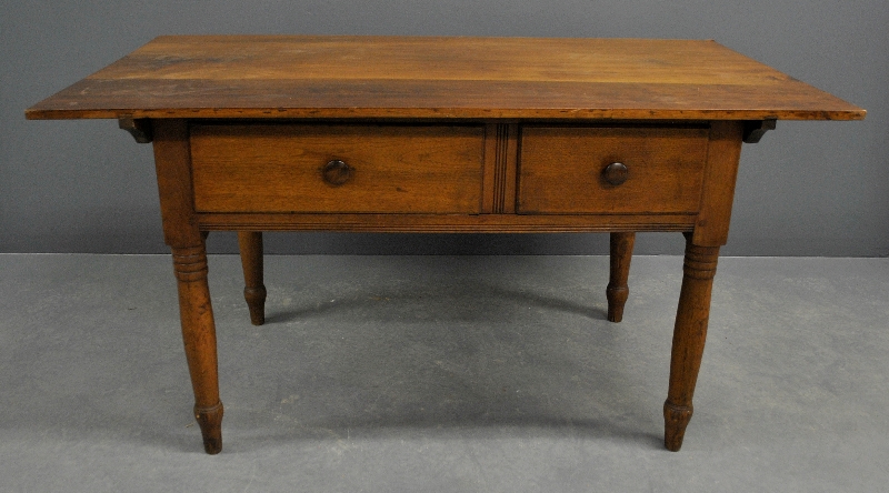 Appraisal: - Pennsylvania walnut tavern table c with overhanging top and