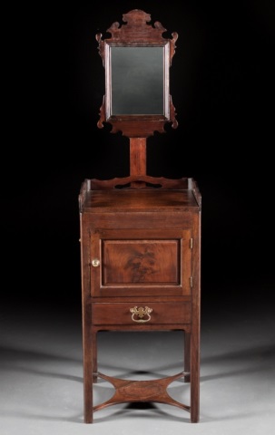 Appraisal: George III mahogany bedside stand circa with pierced gallery cabinet