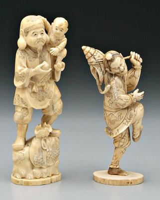 Appraisal: Two Japanese ivory okimonos figural carvings Daikoku holding child in