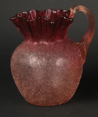 Appraisal: AN AMERICAN CRANBERRY CRAQUELLE GLASS PITCHER by the Reading Artistic