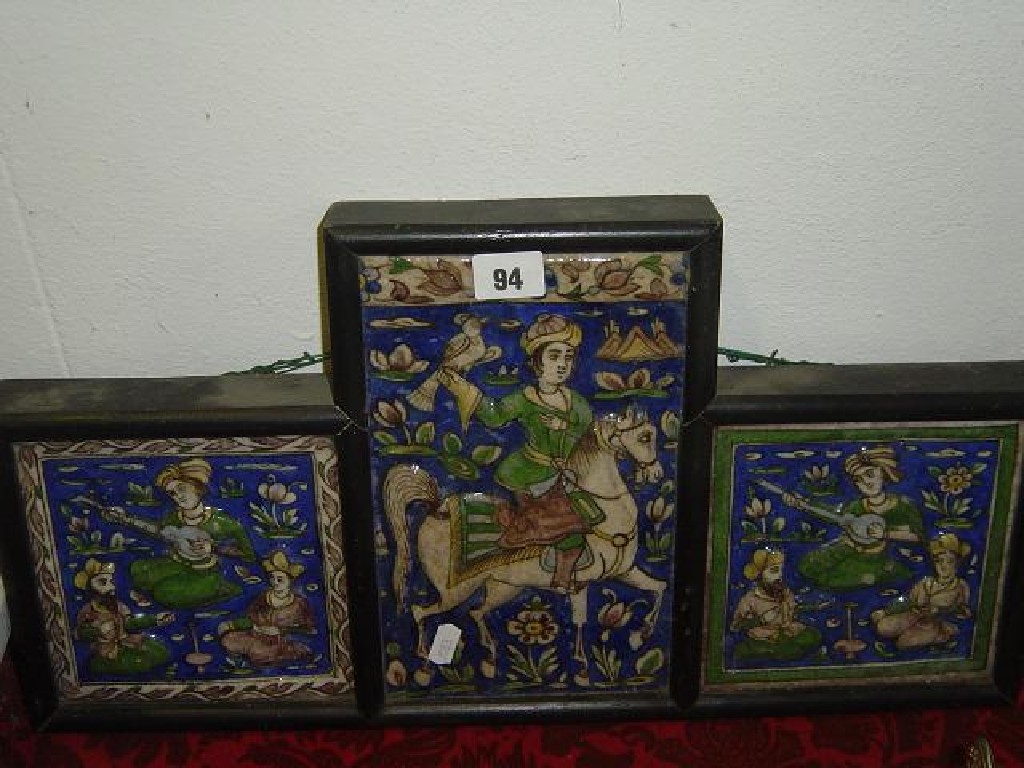 Appraisal: A set of Persian type blue ground tiles with relief