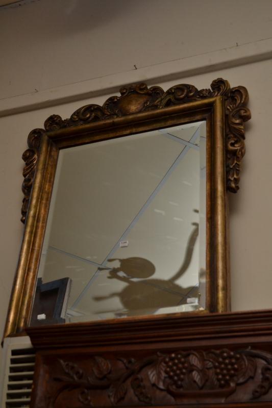 Appraisal: A DECORATIVE EMPIRE STYLE MIRROR FEATURING A BEVELLED EDGE MIRROR