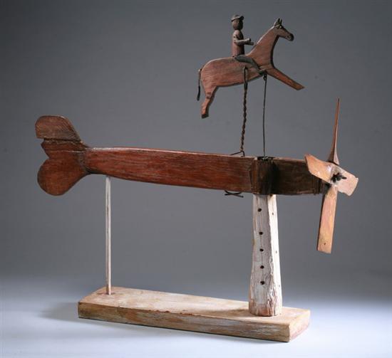 Appraisal: AMERICAN FOLK ART CARVED WOODEN WHIRLIGIG OF HORSE AND RIDER