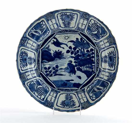 Appraisal: Delft blue and white pictorial charger th century wide alternating