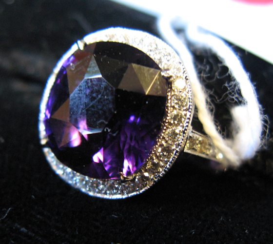 Appraisal: AMETHYST DIAMOND AND EIGHTEEN KARAT WHITE GOLD RING centering a