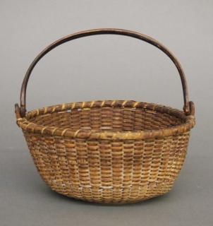 Appraisal: Nantucket Lightship basket A late th century Nantucket Lightship basket