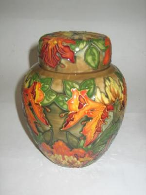 Appraisal: A MOORCROFT POTTERY GINGER JAR of ovoid form tube lined