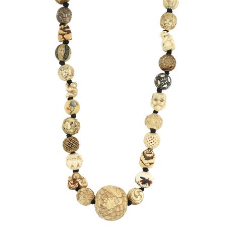 Appraisal: Antique Japanese Carved Ivory Bead Necklace Estimate -