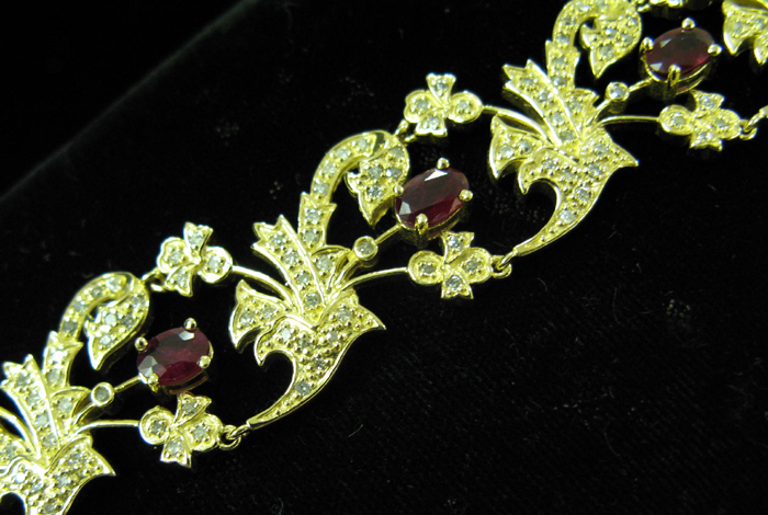 Appraisal: RUBY DIAMOND AND FOURTEEN KARAT GOLD BRACELET WITH APPRAISAL The