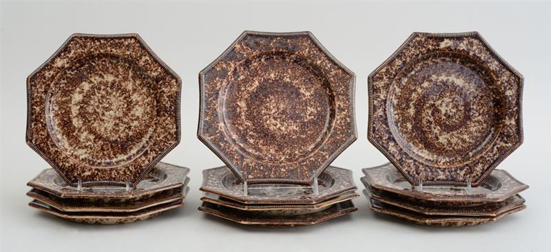 Appraisal: SET OF TWELVE WHIELDON STYLE TORTOISESHELL-GLAZED POTTERY OCTAGONAL PLATES With