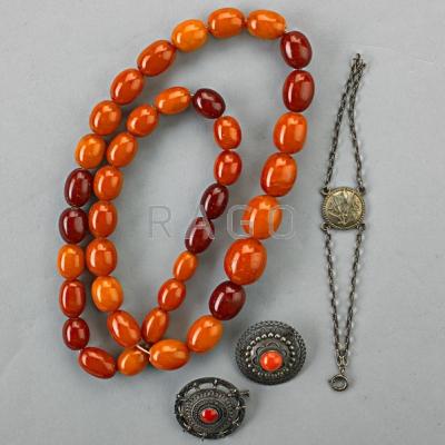 Appraisal: AMBER BEAD NECKLACE CORAL OR SILVER JEWELRY Strand of graduated