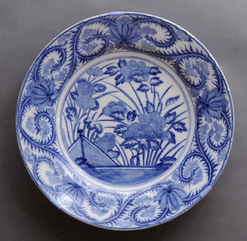 Appraisal: PAIR OF JAPANESE BLUE AND WHITE MASSIVE CHARGERS Each with