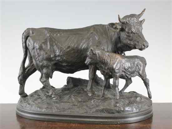 Appraisal: A late th century Animalier bronze group of a cow