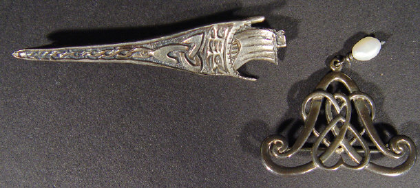 Appraisal: Art Nouveau style silver metal brooch together with an Art