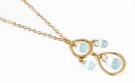 Appraisal: An ct gold briolette cut aquamarine pendant necklace by Tiffany