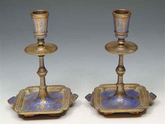 Appraisal: A PAIR OF ANTIQUE FRENCH INDO-MOORISH REVIVAL BRASS CANDLESTICKS with