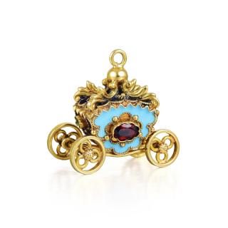 Appraisal: A Gold and Enamel Carriage Charm A charming carriage with