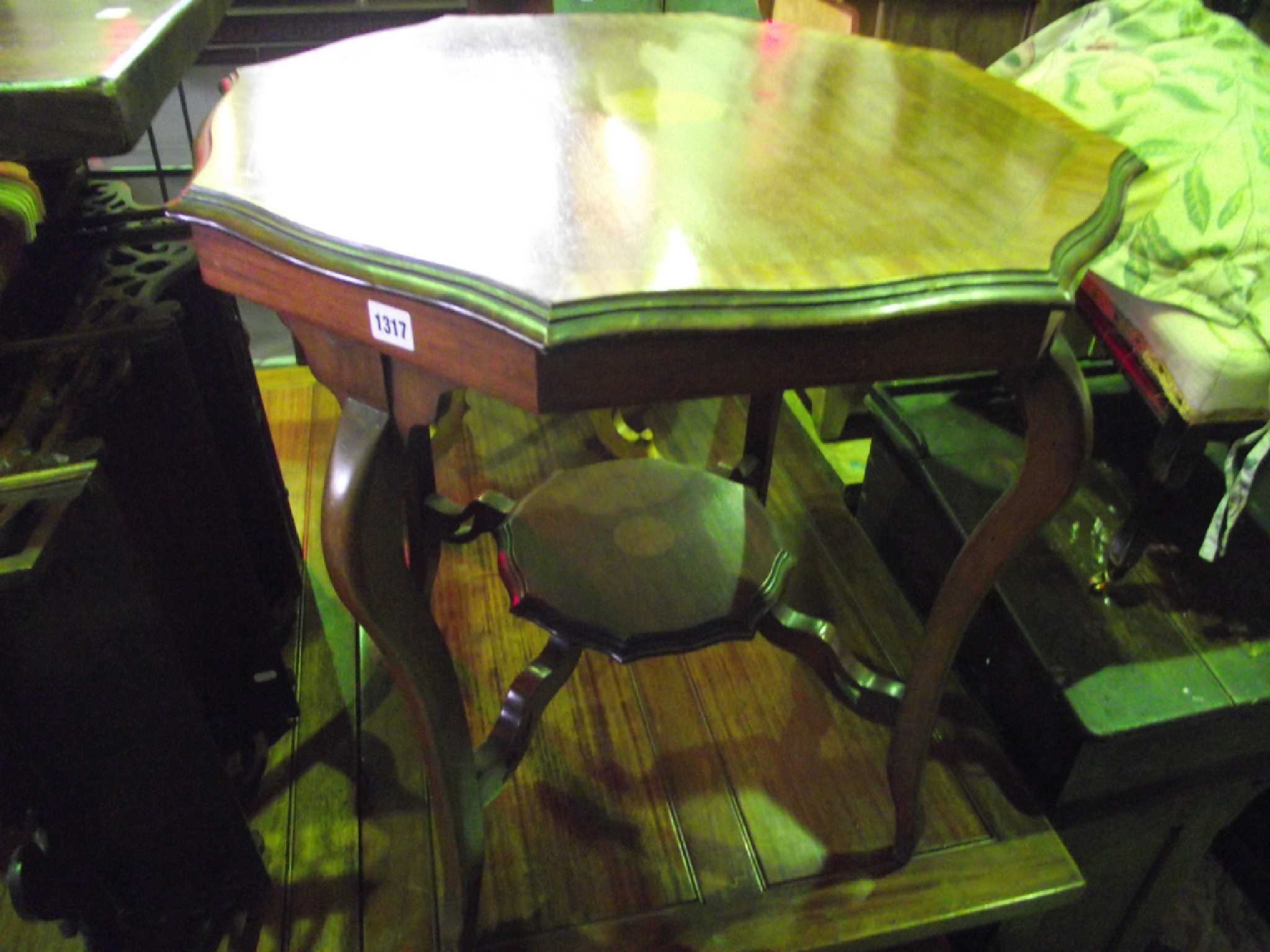 Appraisal: An inlaid Edwardian mahogany occasional table of octagonal form with