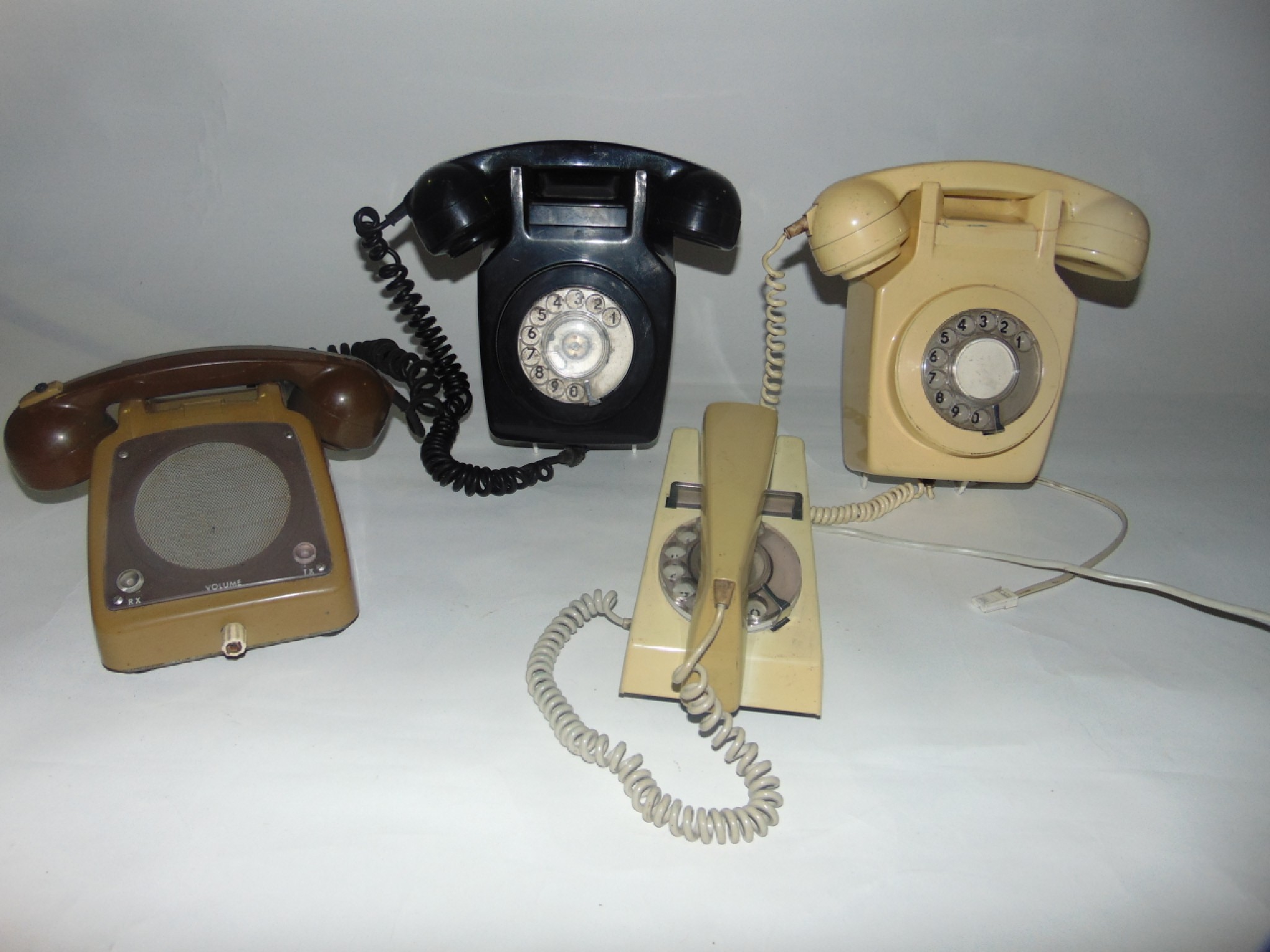 Appraisal: A th century ivory bakelite cased telephone together with a