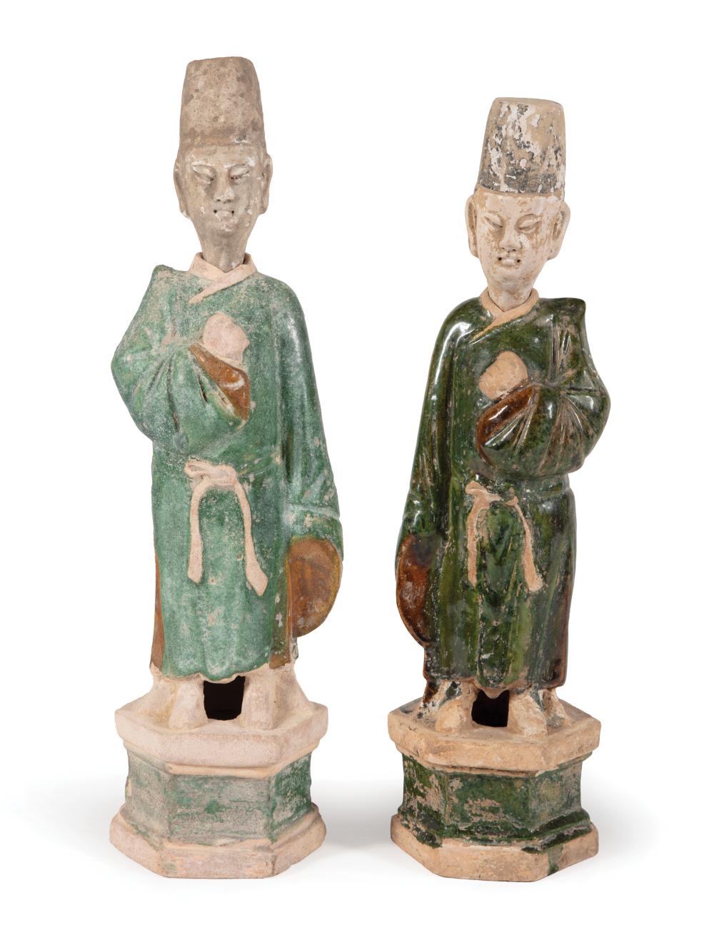 Appraisal: Two Chinese Green and Amber Glazed Pottery Figures Ming Dynasty