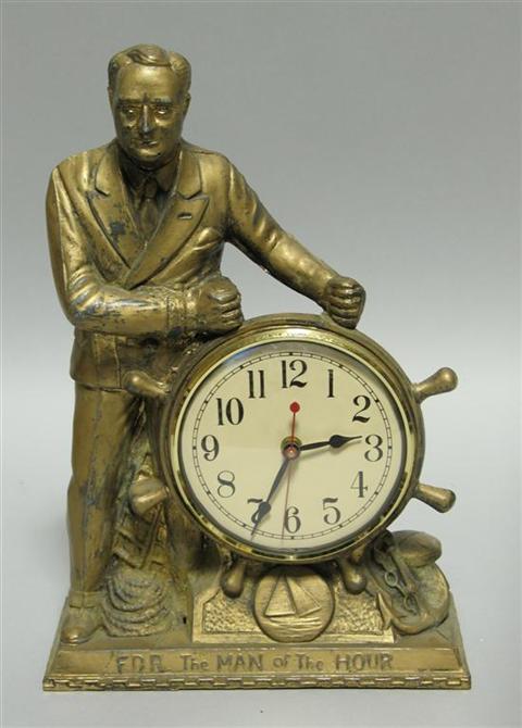 Appraisal: FRANKLIN DELANO ROOSEVELT MAN OF HOUR CLOCK Cast metal battery