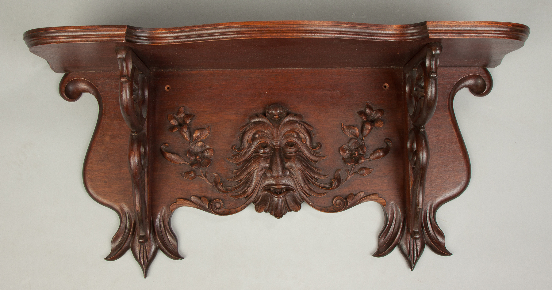 Appraisal: Carved Victorian Walnut Shelf With North wind face