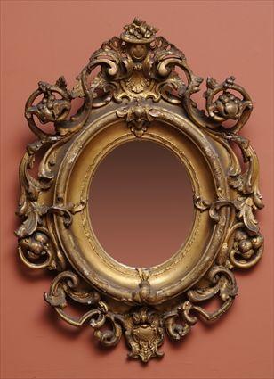 Appraisal: ROCOCO REVIVAL GILT GESSO WALL MIRROR The oval mirror plate