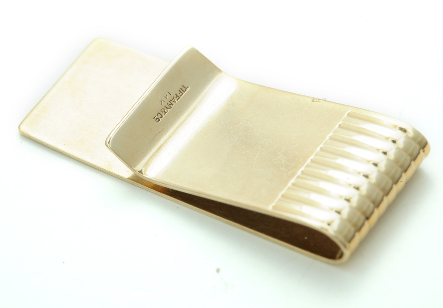 Appraisal: TIFFANY CO GOLD MONEY CLIP American th century Yellow gold