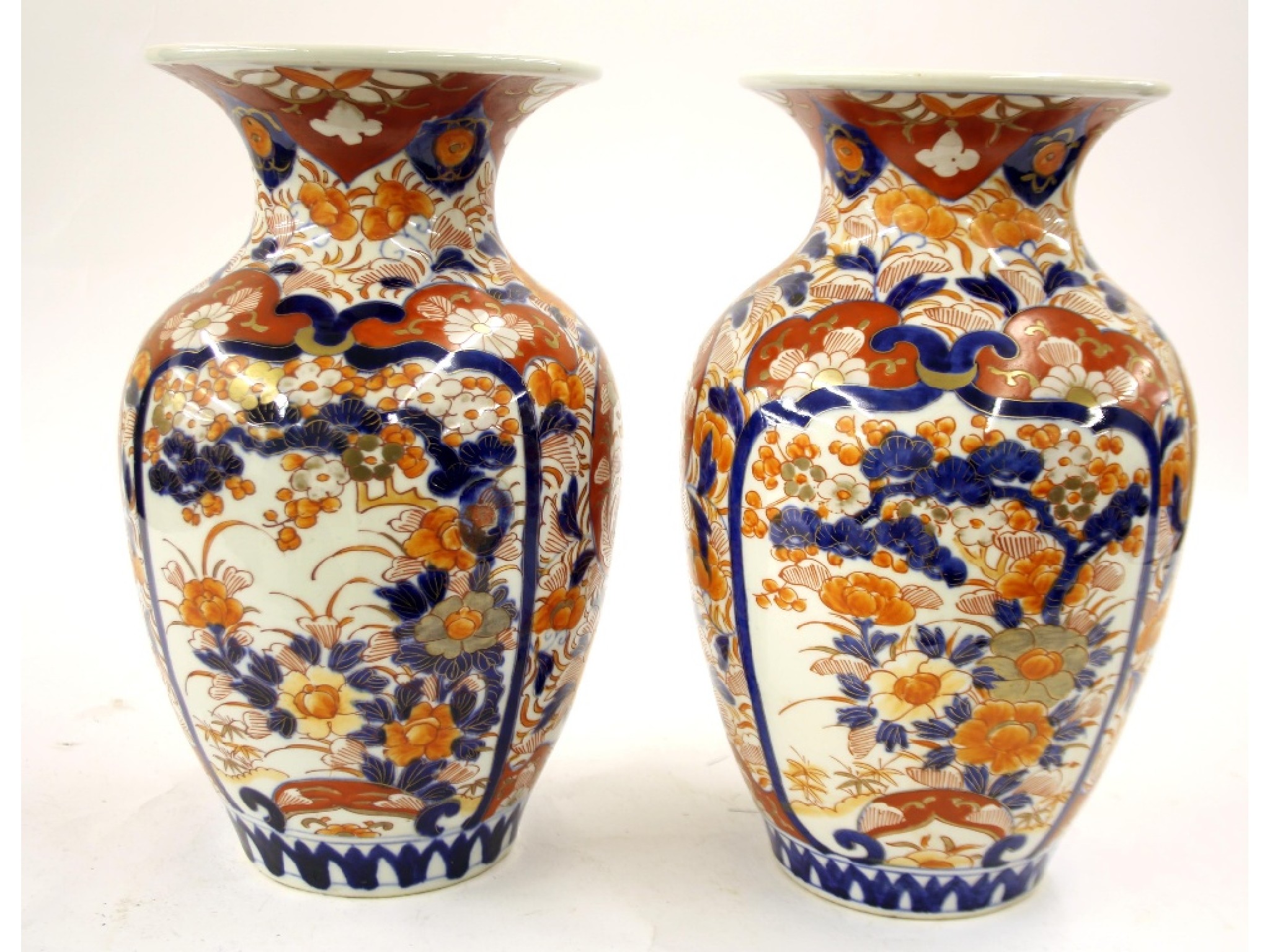 Appraisal: Pair of Japanese Imari porcelain baluster vases decorated with panels