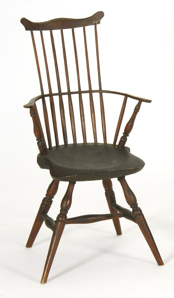 Appraisal: ANTIQUE AMERICAN COMBBACK WINDSOR ARMCHAIR Circa With dark washed finish