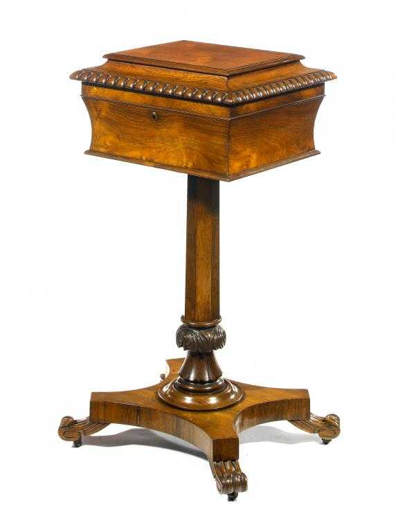 Appraisal: A WILLIAM IV ROSEWOOD TEAPOY of sarcophagus shape with fitted