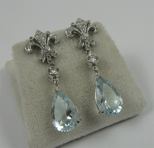 Appraisal: PAIR OF AQUAMARINE DIAMOND AND K GOLD EARRINGS each white