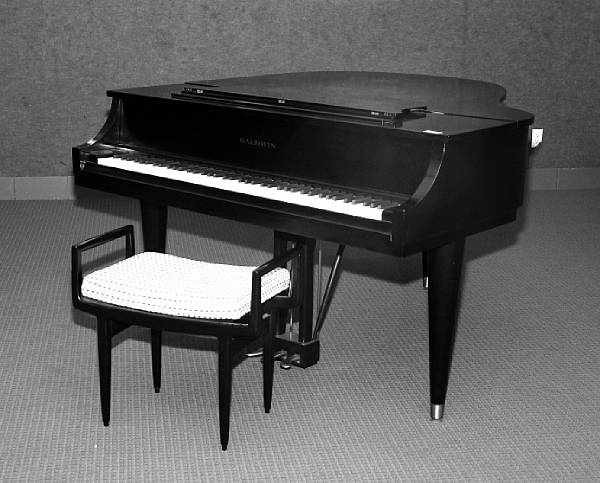 Appraisal: A Baldwin ebonized grand piano stamped length ft in width