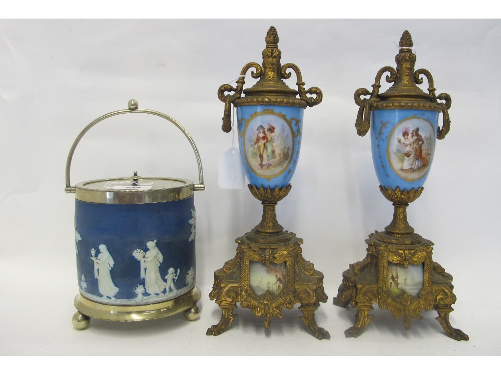 Appraisal: Pair of French porcelain and gilt metal urns and an