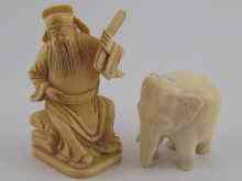 Appraisal: An ivory figure of a Chinese scholar seated on a