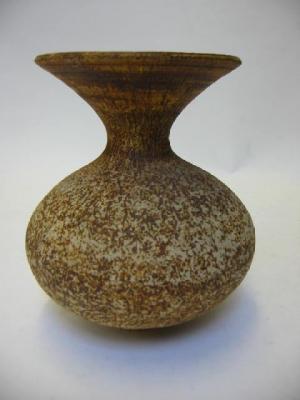 Appraisal: A STONEWARE VASE by Waistel Cooper of squat baluster form