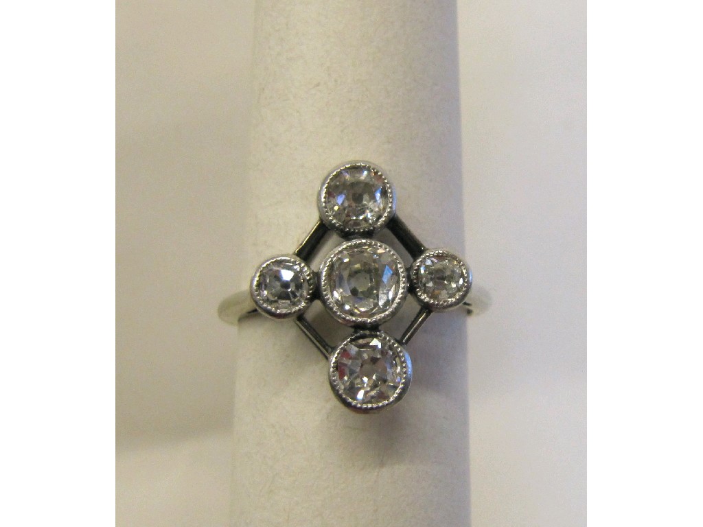 Appraisal: Edwardian platinum diamond five stone ring with milligrain set rose