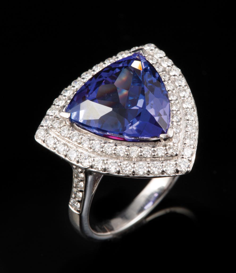 Appraisal: Platinum Tanzanite and Diamond Ring center prong set triangle brilliant