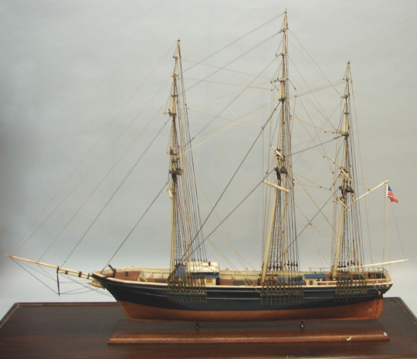 Appraisal: Ship model housed in a glass and wood case ship