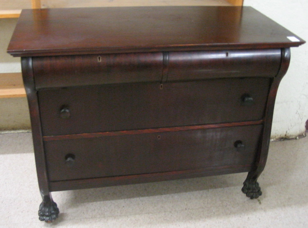 Appraisal: AN EMPIRE REVIVAL MAHOGANY DRESSER American c the front with