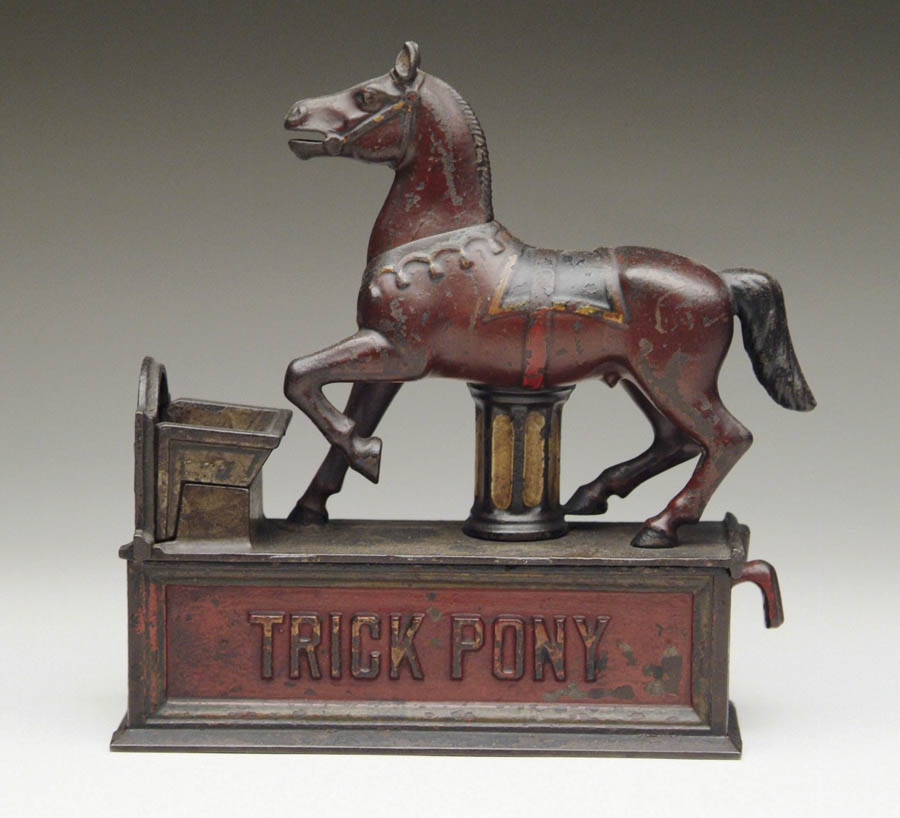 Appraisal: TRICK PONY MECHANICAL BANK Place a coin in pony's mouth