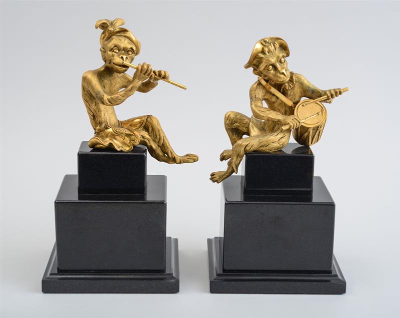 Appraisal: PAIR OF LOUIS XV STYLE GILT-BRONZE SINGERIE FIGURES OF MUSICIANS