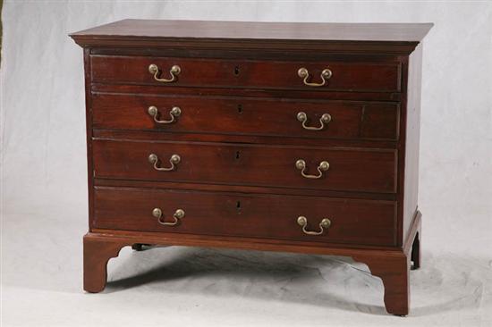 Appraisal: FOUR DRAWER CHEST Walnut with bracket feet and bale handles